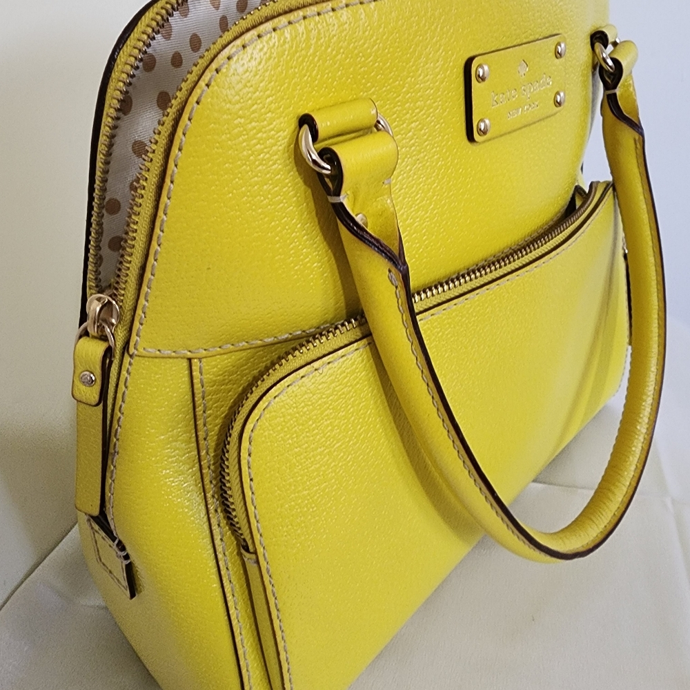 Kate spade, yellow color mid size bag.